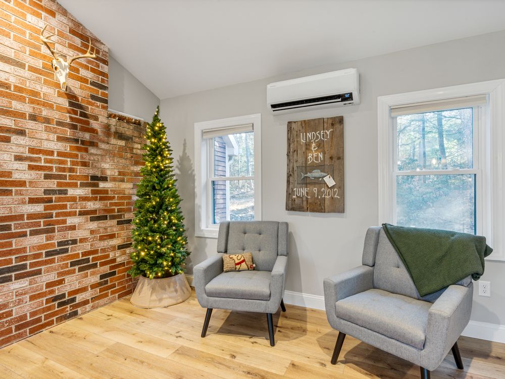 Sitting area against the exposed brick chimney