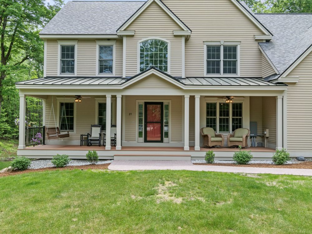 Farmhouse front elevation with full-width covered porch