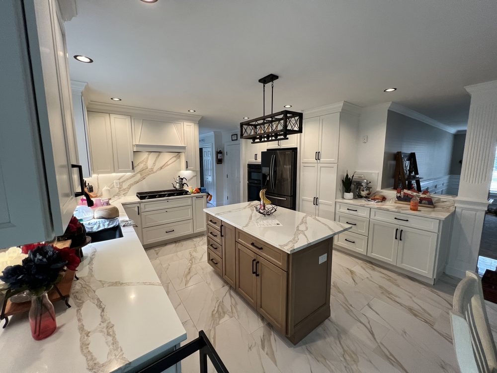 Kitchen fully restored with new cabinetry and marble finishes