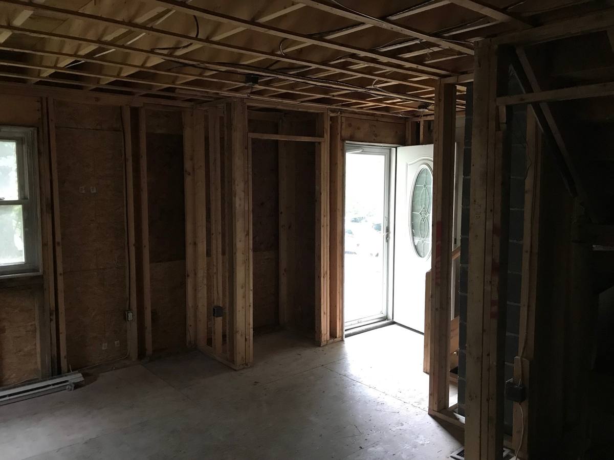 Front room stripped to studs before fire restoration