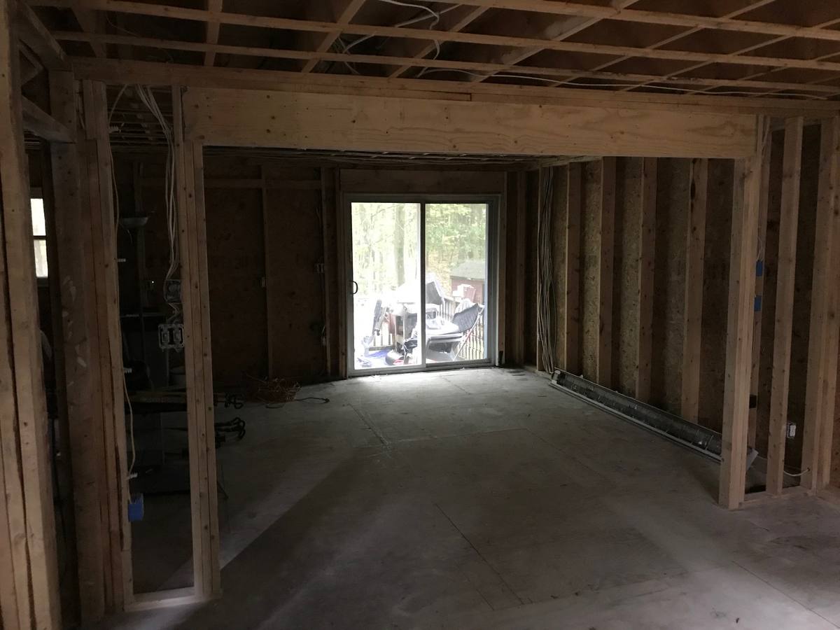 Rear living space framed out, sheathing and wiring exposed