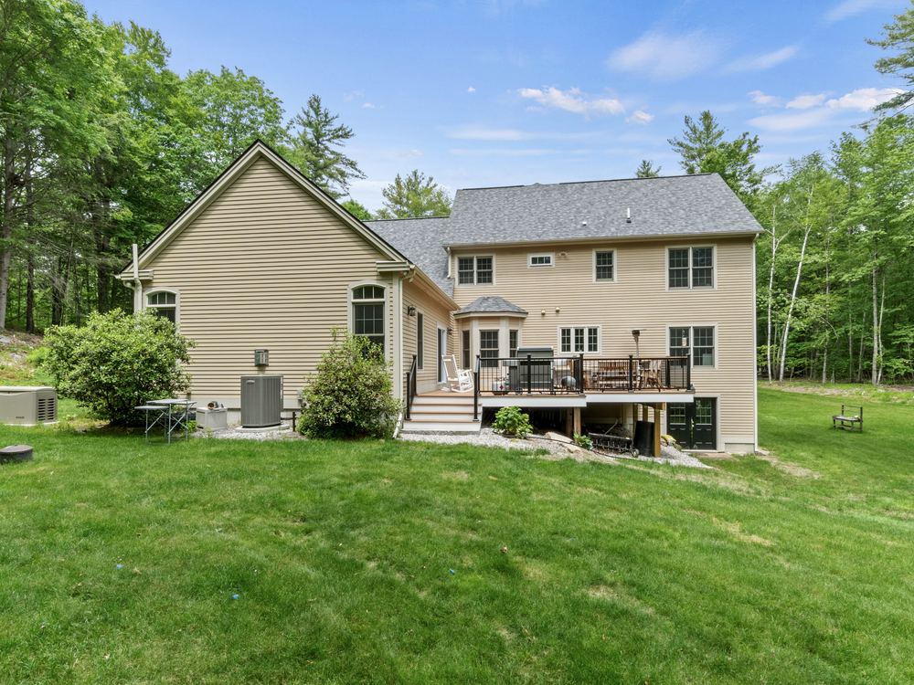 The enlarged composite deck spanning the back of the house
