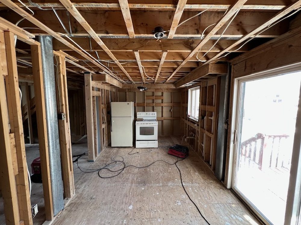 Kitchen stripped to framing